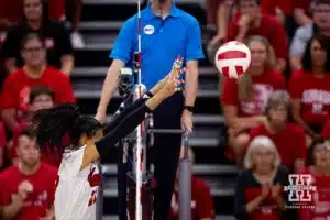 Nebraska Cornhusker Harper Murray (27) jumps to block the ball against the Stanford Cardinal in the second set during a college volleyball match Wednesday, September 18, 2024, in Lincoln, Nebraska. Photo by John S. Peterson.