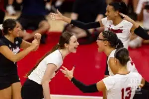 Nebraska Cornhusker Bergen Reilly (2) and Rebekah Allick celebrates a kill against the Stanford Cardinal in the second set during a college volleyball match Wednesday, September 18, 2024, in Lincoln, Nebraska. Photo by John S. Peterson.