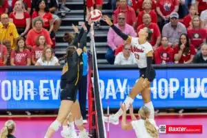 Nebraska Cornhusker Merritt Beason (13) bumps the ball over the net against Wichita State during the college volleyball match Saturday, September 15, 2024, in Lincoln, Nebraska. Photo Jaelle Johnson.