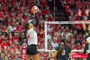 Nebraska Cornhusker Taylor Landfair (12) spikes the ball against Wichita State during the college volleyball match Saturday, September 15, 2024, in Lincoln, Nebraska. Photo Jaelle Johnson.