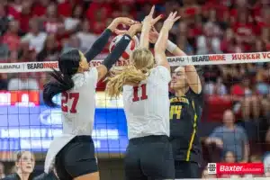 Nebraska Cornhusker Harper Murray (27) and Leyla Blackwell (11) battle at the net against Wichita State during the college volleyball match Saturday, September 15, 2024, in Lincoln, Nebraska. Photo Jaelle Johnson.