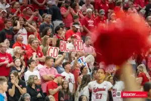 Nebraska Cornhusker fans holding up a Go Big Red signs against Wichita State during the college volleyball match Saturday, September 15, 2024, in Lincoln, Nebraska. Photo Jaelle Johnson.