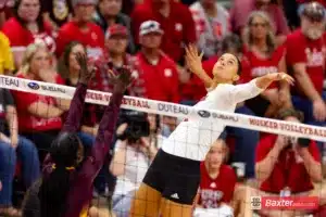 Nebraska Cornhusker Merritt Beason (13) spikes the ball against the Arizona State Sundevils in the third set during the college volleyball match Friday, September 13, 2024, in Lincoln, Nebraska. Photo John S. Peterson.