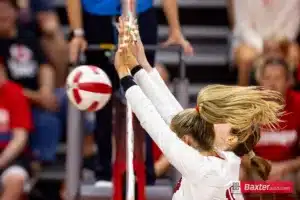 Nebraska Cornhusker Andi Jackson (15) and Bergen Reilly block the ball against the Arizona State Sundevils in the third set during the college volleyball match Friday, September 13, 2024, in Lincoln, Nebraska. Photo John S. Peterson.