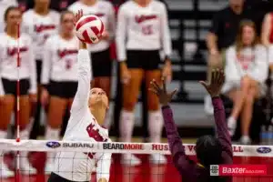 Nebraska Cornhusker Merritt Beason (13) spikes the ball against the Arizona State Sundevils in the second set during the college volleyball match Friday, September 13, 2024, in Lincoln, Nebraska. Photo John S. Peterson.