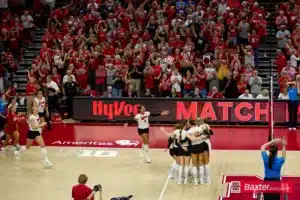Nebraska Cornhuskers celebrate the win over the Creighton Bluejays during the college volleyball match Tuesday, September 10, 2024, in Lincoln, Nebraska. Photo John S. Peterson.
