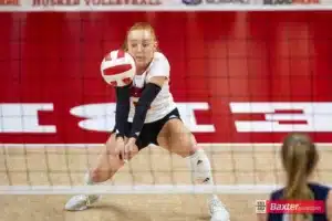 Nebraska Cornhusker Olivia Mauch (10) digs the ball against the Creighton Bluejays during the college volleyball match Tuesday, September 10, 2024, in Lincoln, Nebraska. Photo John S. Peterson.