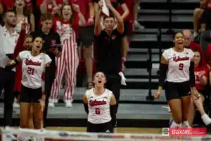 Nebraska Cornhuskers celebrate a kill against the Creighton Bluejays during the college volleyball match Tuesday, September 10, 2024, in Lincoln, Nebraska. Photo John S. Peterson.