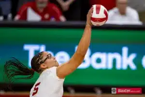 Nebraska Cornhusker middle blocker Rebekah Allick (5) spikes the ball against the Creighton Bluejays in the third set during the college volleyball match Tuesday, September 10, 2024, in Lincoln, Nebraska. Photo John S. Peterson.