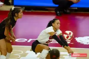Nebraska Cornhusker outside hitter Harper Murray (27) digs the ball against the Creighton Bluejays during the college volleyball match Tuesday, September 10, 2024, in Lincoln, Nebraska. Photo John S. Peterson.