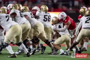 Nebraska Cornhusker linebacker John Bullock (5) slides in to tackle Colorado Buffalo running back Charlie Offerdahl (44) in the fourth quarter during the college football game Saturday, September 7, 2024, in Lincoln, Nebraska. Photo John S. Peterson.