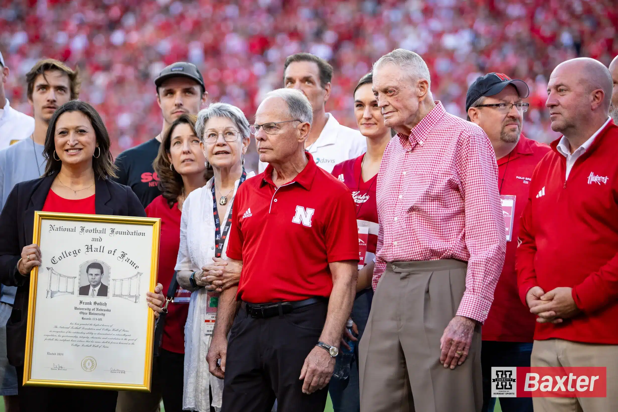 Nebraska Cornhusker coaches Frank Solich and Tom Osborne celebrates Frank Solich induction to the College Hall of Fame during the college football game Saturday, September 7, 2024, in Lincoln, Nebraska. Photo John S. Peterson.