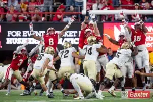 Nebraska Cornhusker defensive lineman Ty Robinson (9) blocks a kick for extra points against the Colorado Buffaloes in the second quarter during the college football game Saturday, September 7, 2024, in Lincoln, Nebraska. Photo John S. Peterson.