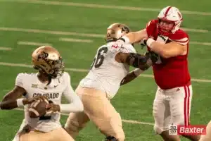Nebraska Cornhuskers defensive lineman Nash Hutmacher (0) eyes Colorado Buffaloes quarterback Shedeur Sanders (2) during a game against the Colorado Buffaloes Saturday, September 7th 2024 at Memorial Stadium in Lincoln, Nebraska. Nebraska Photo by Eric Francis