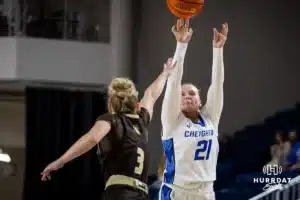 Creighton Bluejay guard Molly Mogensen (21) makes a three point shot over Southwest Minnesota State Mustang guard Zoie Centers (3) in the second half during a college women’s basketball game Thursday, October 30, 2024, in Lincoln, Nebraska. Photo by John S. Peterson.