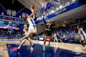 Creighton Bluejay guard Kennedy Townsend (2) makes a lay up against Southwest Minnesota State Mustang guard Bri Stoltzman (2) in the second half during a college women’s basketball game Thursday, October 30, 2024, in Lincoln, Nebraska. Photo by John S. Peterson.