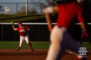 Nebraska Cornhusker Lauren Camenzind (2) throws to first for an out during the Red White softball game Wednesday, October 23, 2024, in Lincoln, Nebraska. Photo by John S. Peterson.
