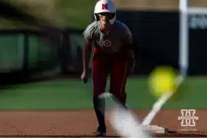 Nebraska Cornhusker Jordyn Bahl (98) watches the pitch from third base during the Red White softball game Wednesday, October 23, 2024, in Lincoln, Nebraska. Photo by John S. Peterson.