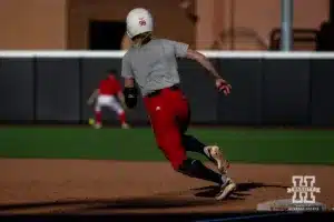 Nebraska Cornhusker Jordyn Bahl (98) rounds first after hitting the ball in right field for a triple during the Red White softball game Wednesday, October 23, 2024, in Lincoln, Nebraska. Photo by John S. Peterson.
