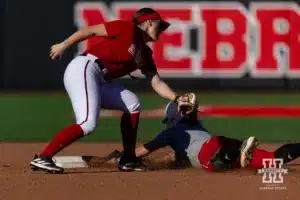 Nebraska Cornhusker Jordyn Bahl (98) slides to second against Lauren Camenzind (2) during the Red White softball game Wednesday, October 23, 2024, in Lincoln, Nebraska. Photo by John S. Peterson.