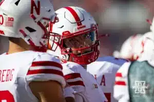 Nebraska Cornhusker quarterback Dylan Raiola (15) talks to Heinrich Haarberg against the Indiana Hoosiers during a football game Saturday, October 19, 2024, in Bloomington, Indiana. Photo by John S. Peterson.