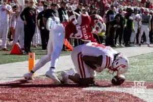 Nebraska Cornhusker wide receiver Jahmal Banks (4) tries to make a catch against Indiana Hoosier defensive back Jamier Johnson (9) during a football game Saturday, October 19, 2024, in Bloomington, Indiana. Photo by John S. Peterson.