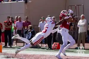Indiana Hoosier wide receiver Elijah Sarratt (13) makes a catch for a touchdown against Nebraska Cornhusker defensive back Ceyair Wright (15) during a football game Saturday, October 19, 2024, in Bloomington, Indiana. Photo by John S. Peterson.