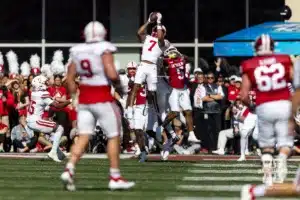 Nebraska Cornhusker defensive back Malcolm Hartzog Jr. (7) intercepts the ball against the Indiana Hoosiers during a football game Saturday, October 19, 2024, in Bloomington, Indiana. Photo by John S. Peterson.