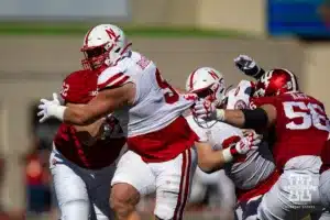 Nebraska Cornhusker defensive lineman Ty Robinson (9) battles against Indiana Hoosier offensive lineman Drew Evans (62) during a football game Saturday, October 19, 2024, in Bloomington, Indiana. Photo by John S. Peterson.