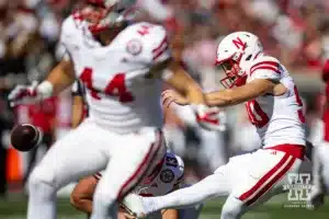 Nebraska Cornhusker place kicker John Hohl (90) kicks an extra point against the Indiana Hoosiers during a football game Saturday, October 19, 2024, in Bloomington, Indiana. Photo by John S. Peterson.