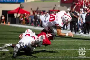 Nebraska Cornhusker quarterback Heinrich Haarberg (10) runs with the ball against Indiana Hoosier defensive back D'Angelo Ponds (5) during a football game Saturday, October 19, 2024, in Bloomington, Indiana. Photo by John S. Peterson.