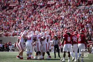 Nebraska Cornhuskers huddle up against the Indiana Hoosiers during a football game Saturday, October 19, 2024, in Bloomington, Indiana. Photo by John S. Peterson.