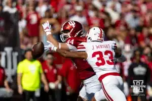 Nebraska Cornhusker linebacker Javin Wright (33) breaks up a pass to Indiana Hoosier tight end Zach Horton (44) during a football game Saturday, October 19, 2024, in Bloomington, Indiana. Photo by John S. Peterson.
