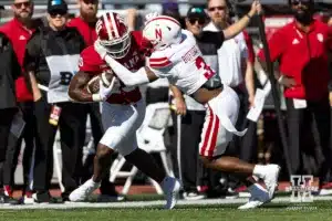 Nebraska Cornhusker defensive back Marques Buford Jr. (3) tackles Indiana Hoosier wide receiver Miles Cross (19) in the first quarter during a football game Saturday, October 19, 2024, in Bloomington, Indiana. Photo by John S. Peterson.