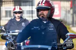 ndiana motor police officer gave a police escort for the Huskers before a football game against the Indiana Hoosiers Saturday, October 19, 2024, in Bloomington, Indiana. Photo by John S. Peterson.