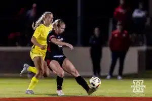 Nebraska Cornhusker forward Sarah Weber (42) kicks the ball down the ptich against the Oregon Ducks in the first half during a soccer match Thursday, October 17, 2024, in Lincoln, Nebraska. Photo by John S. Peterson.