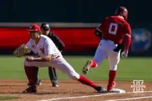 Nebraska's Case Sanderson (14) makes a out against Nebraska's Cayden Brumbaugh (0) in the third inning during a baseball scrimmage Tuesday, October 15, 2024, in Lincoln, Nebraska. Photo by John S. Peterson.