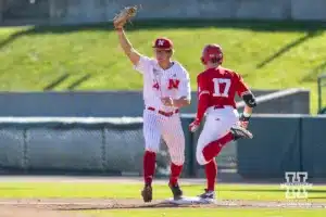 Nebraska's Case Sanderson (14) makes a out against Nebraska's Hayden Lewis (17) in the second inning during a baseball scrimmage Tuesday, October 15, 2024, in Lincoln, Nebraska. Photo by John S. Peterson.