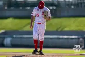 Nebraska Bugeater pitcher TJ Coats (47) cleans up the mound with his shoe during a baseball scrimmage Tuesday, October 15, 2024, in Lincoln, Nebraska. Photo by John S. Peterson.