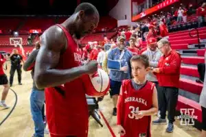 Nebraska Cornhusker Juwan Gary signs an autography for a young fan after the scrimmage Sunday, October 13, 2024, in Lincoln, Nebraska. Photo by John S. Peterson.