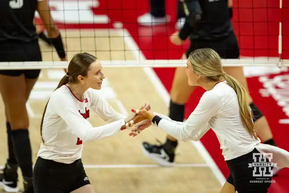 Nebraska Volleyball v Purdue – October 11, 2024. Nebraska Cornhusker Bergen Reilly (2) and Andi Jackson celebrate a point against the Purdue Boilermakers during a college volleyball match Friday, October 11, 2024, in Lincoln, Nebraska. Photo by John S. Peterson.