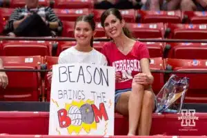 Nebraska Cornhusker fans showing up early to watch warm-ups and showing off their sign during a college volleyball match against the Purdue Boilermakers Friday, October 11, 2024, in Lincoln, Nebraska. Photo by John S. Peterson.