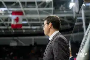 Omaha Maverick head coach Mike Gabinet watching the action on the ice against the Wisconsin Badgers in a college hockey match Saturday, October 5, 2024 in Omaha, Nebraska. Photo by Kyle Byers.
