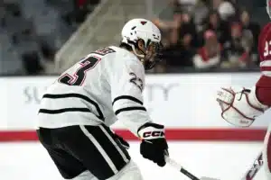 Omaha Maverick Harrison Israels (23) readies for the puck against the Wisconsin Badgers in a college hockey match Saturday, October 5, 2024 in Omaha, Nebraska. Photo by Kyle Byers.