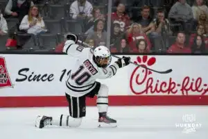 Omaha Maverick Jacob Guevin (10) takes a shot against the Wisconsin Badgers in a college hockey match Saturday, October 5, 2024 in Omaha, Nebraska. Photo by Kyle Byers.