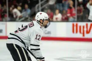 Omaha Maverick Nolan Krenzen readies for action against the Wisconsin Badgers in a college hockey match Saturday, October 5, 2024 in Omaha, Nebraska. Photo by Kyle Byers.