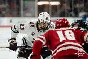 Omaha Maverick Harrison Israels (23) preparing for a face-off against the Wisconsin Badgers in a college hockey match Saturday, October 5, 2024 in Omaha, Nebraska. Photo by Kyle Byers.