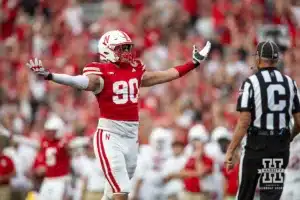 Nebraska Cornhusker defensive lineman James Williams (90) celebrates a sack against the Rutgers Scarlet Knights during a college football game Saturday, October 5, 2024, in Lincoln, Nebraska. Photo by John S. Peterson.