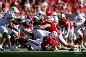 Nebraska Cornhusker defensive back Isaac Gifford (2) tackles Rutgers Scarlet Knight running back Kyle Monangai (5) during a college football game Saturday, October 5, 2024, in Lincoln, Nebraska. Photo by John S. Peterson.