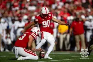 Nebraska Cornhusker place kicker John Hohl (90) makes an extra point against the Rutgers Scarlet Knights during a college football game Saturday, October 5, 2024, in Lincoln, Nebraska. Photo by John S. Peterson.